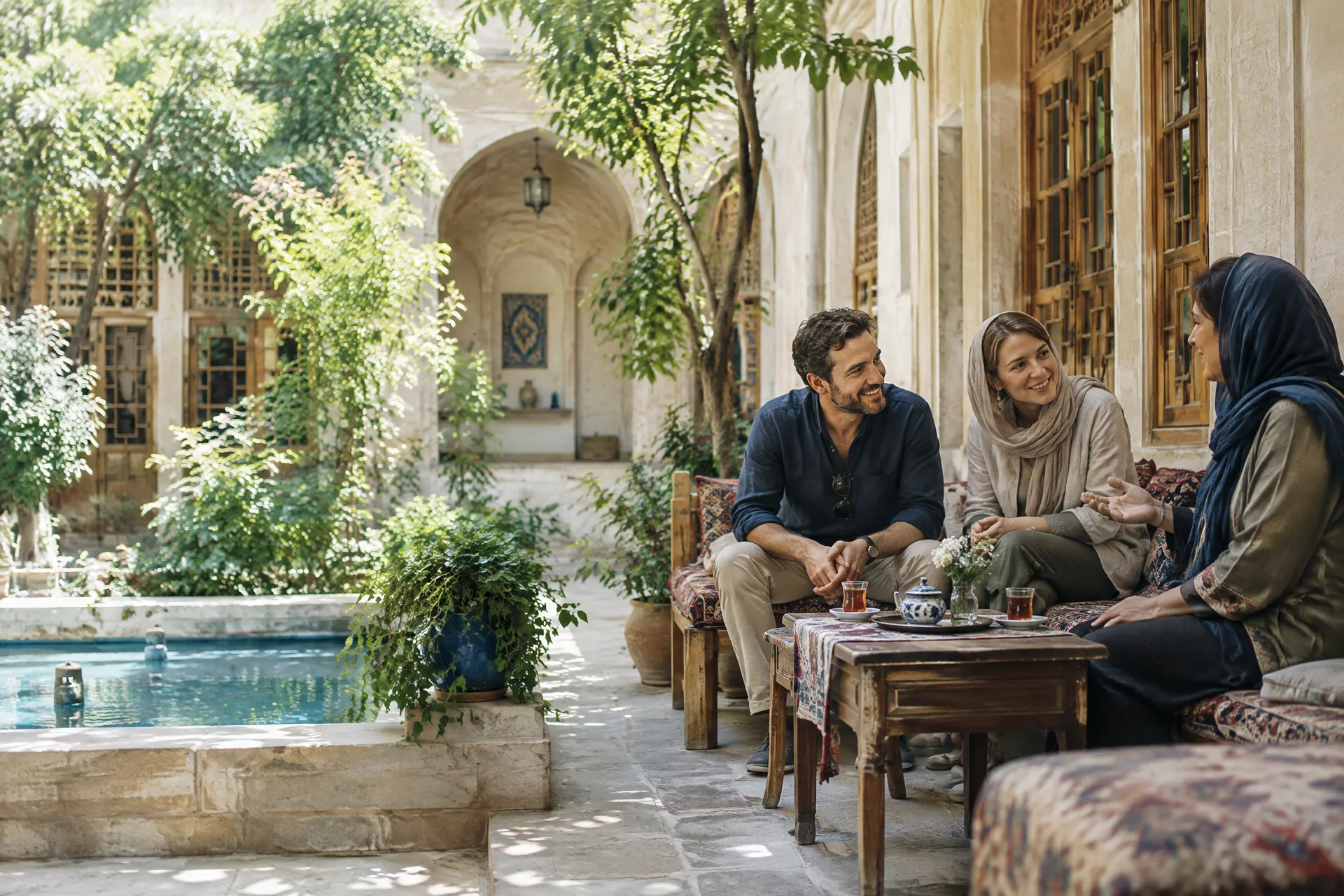 Travelers in an Iranian courtyard