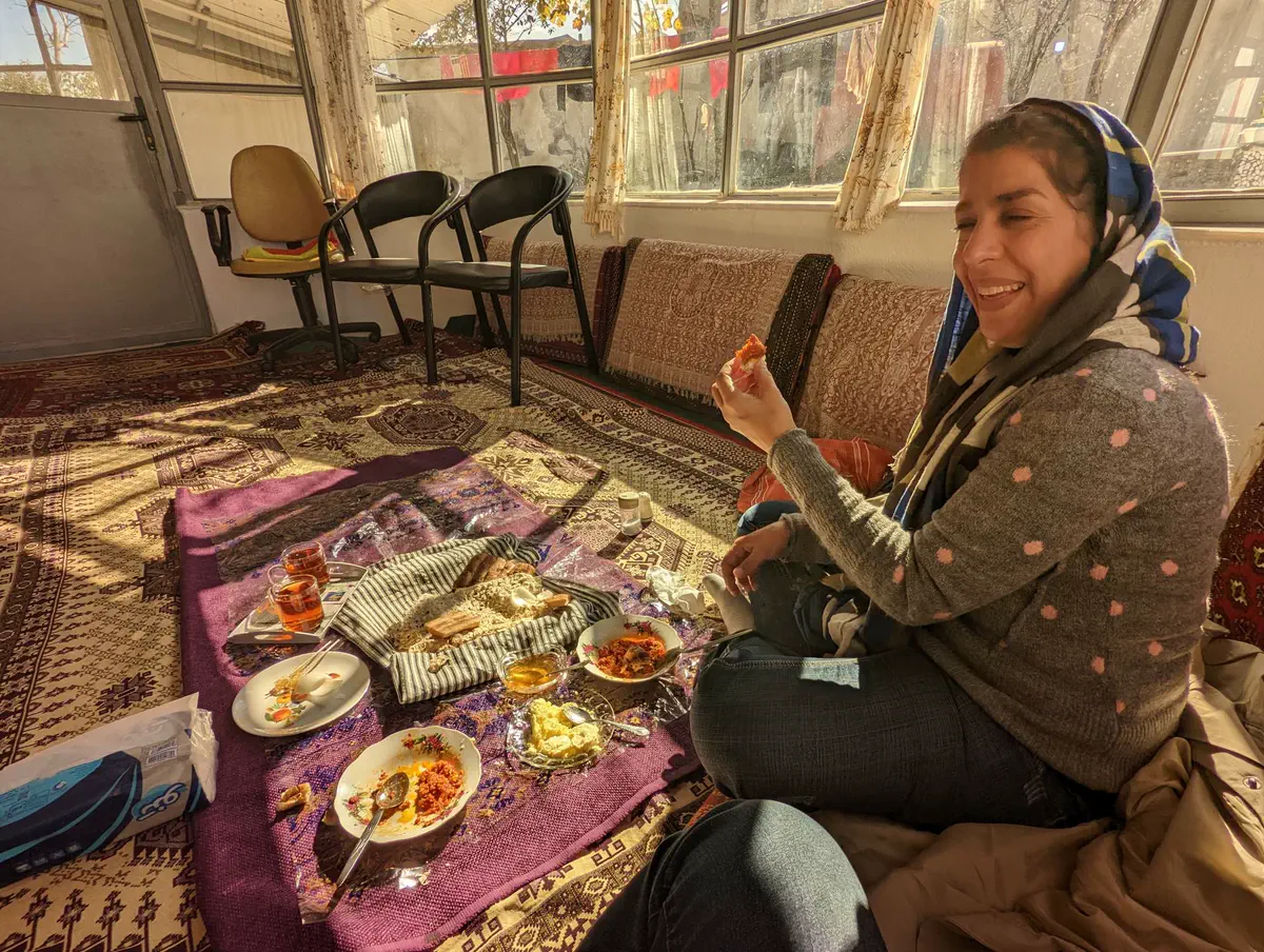 Iranian shared table with food and conversation